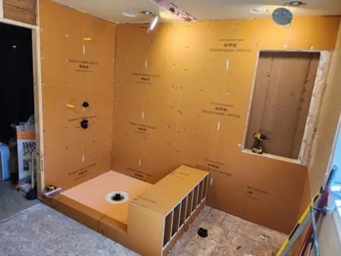 Shower demo with waterproof backer board