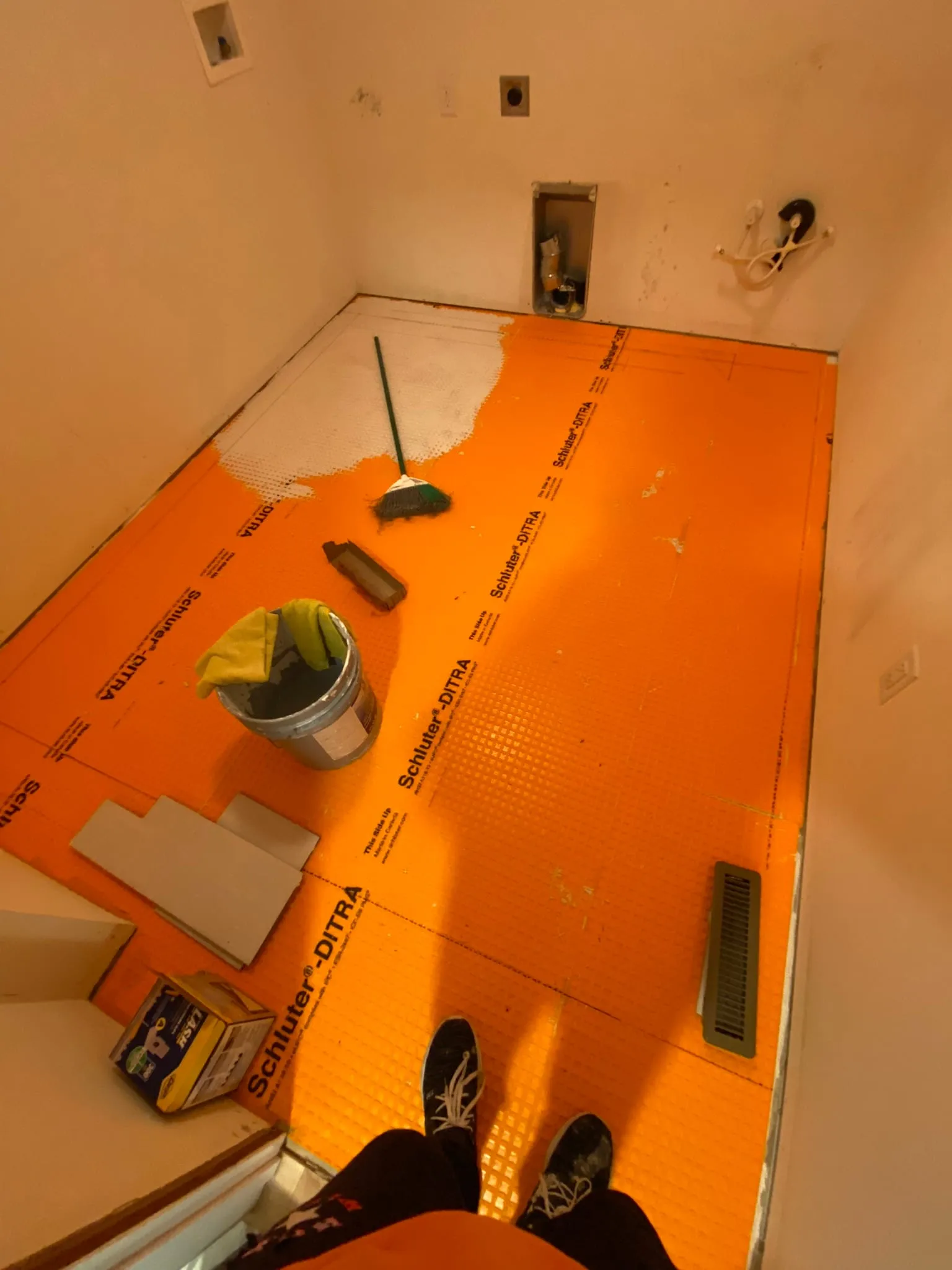 Floor prep with Schluter Ditra underlayment