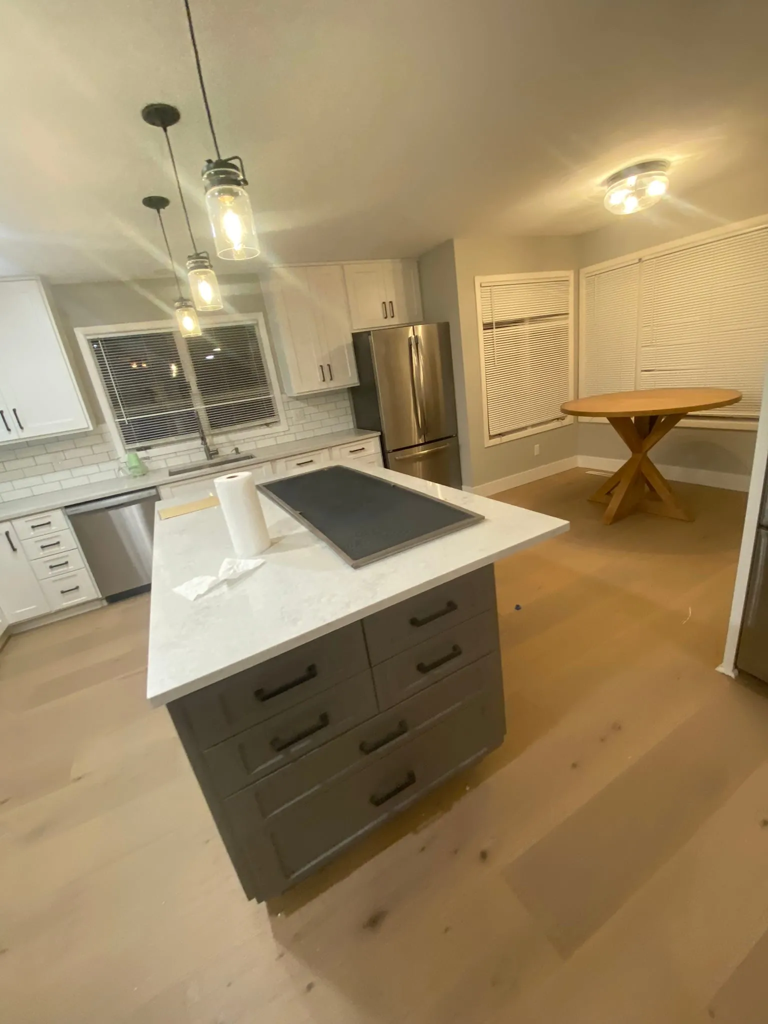 Kitchen with engineered hardwood floor and island